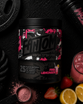 Fantom pre-workout supplement container with pink lemonade flavor, surrounded by strawberries and lemons.