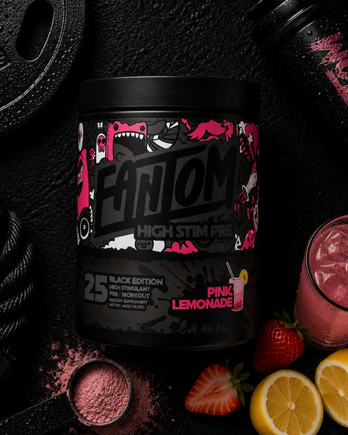 Fantom pre-workout supplement container with pink lemonade flavor, surrounded by strawberries and lemons.