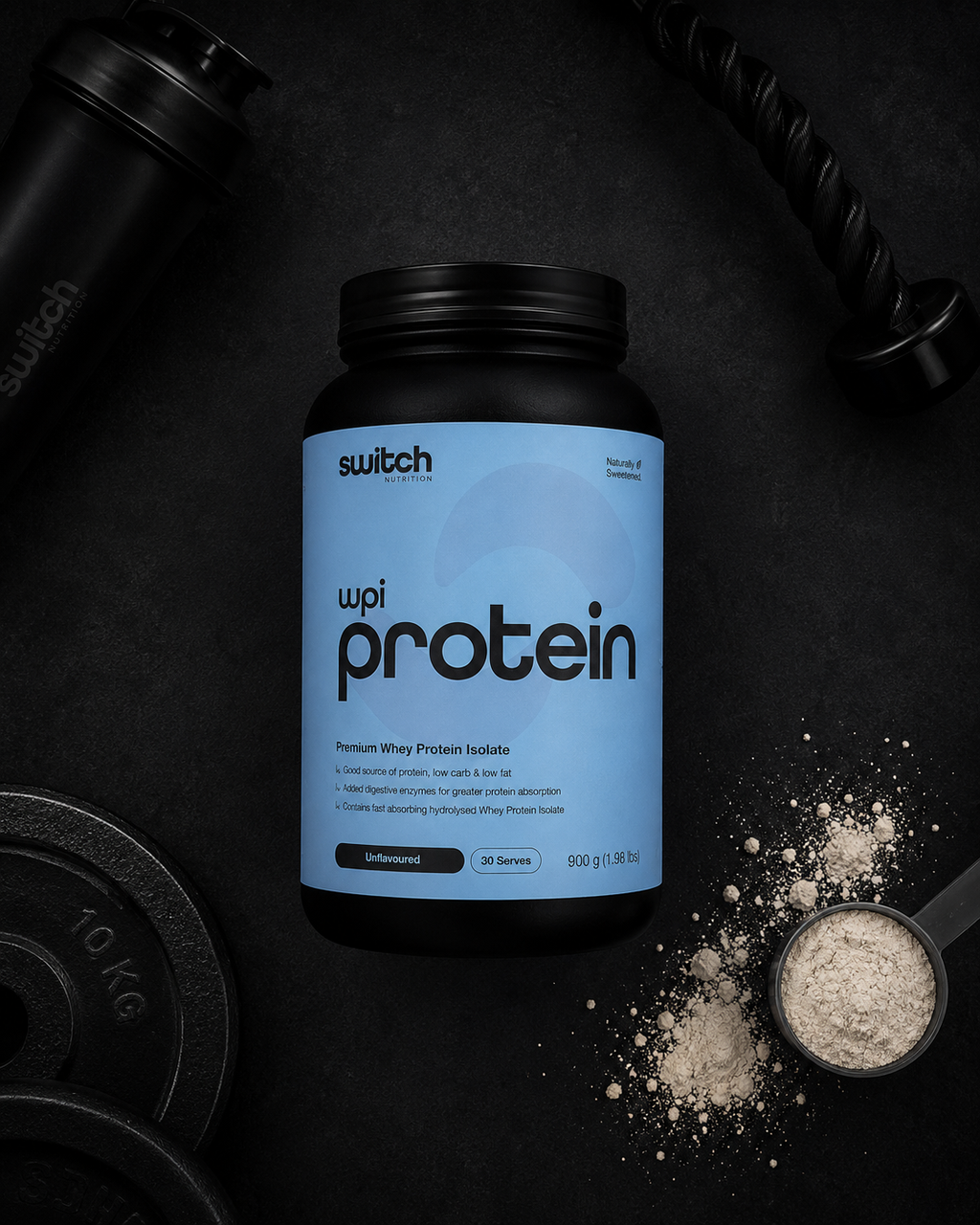 Protein powder container with scoop and weights on a dark background