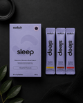 Switch sleep supplement packaging on a dark background