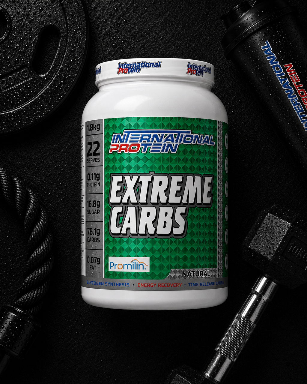 International Protein Extreme Carbs supplement container on a gym equipment background