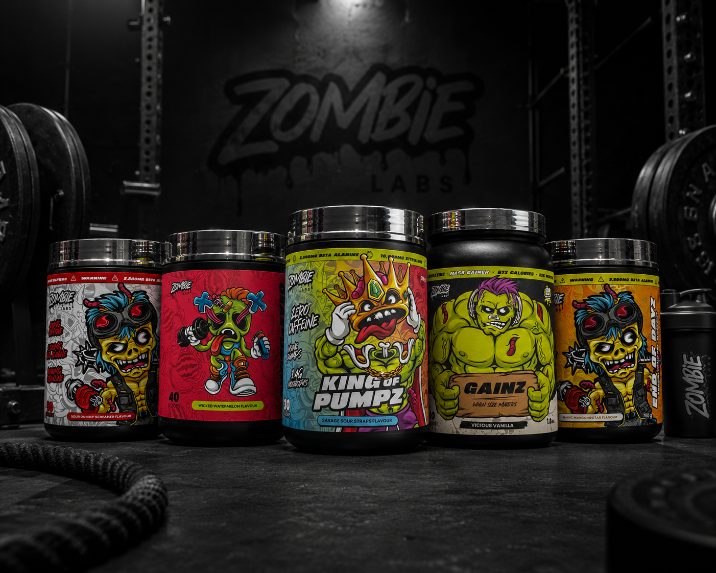 Colorful supplement containers with cartoonish designs on a dark background with 'Zombie Labs' branding.