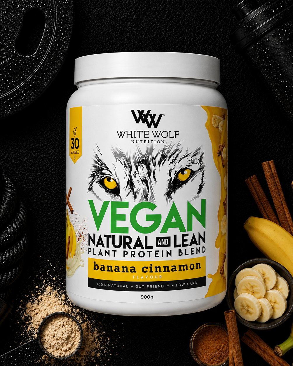 White Wolf Nutrition Vegan Protein Blend container with bananas, cinnamon sticks, and protein powder on a dark background