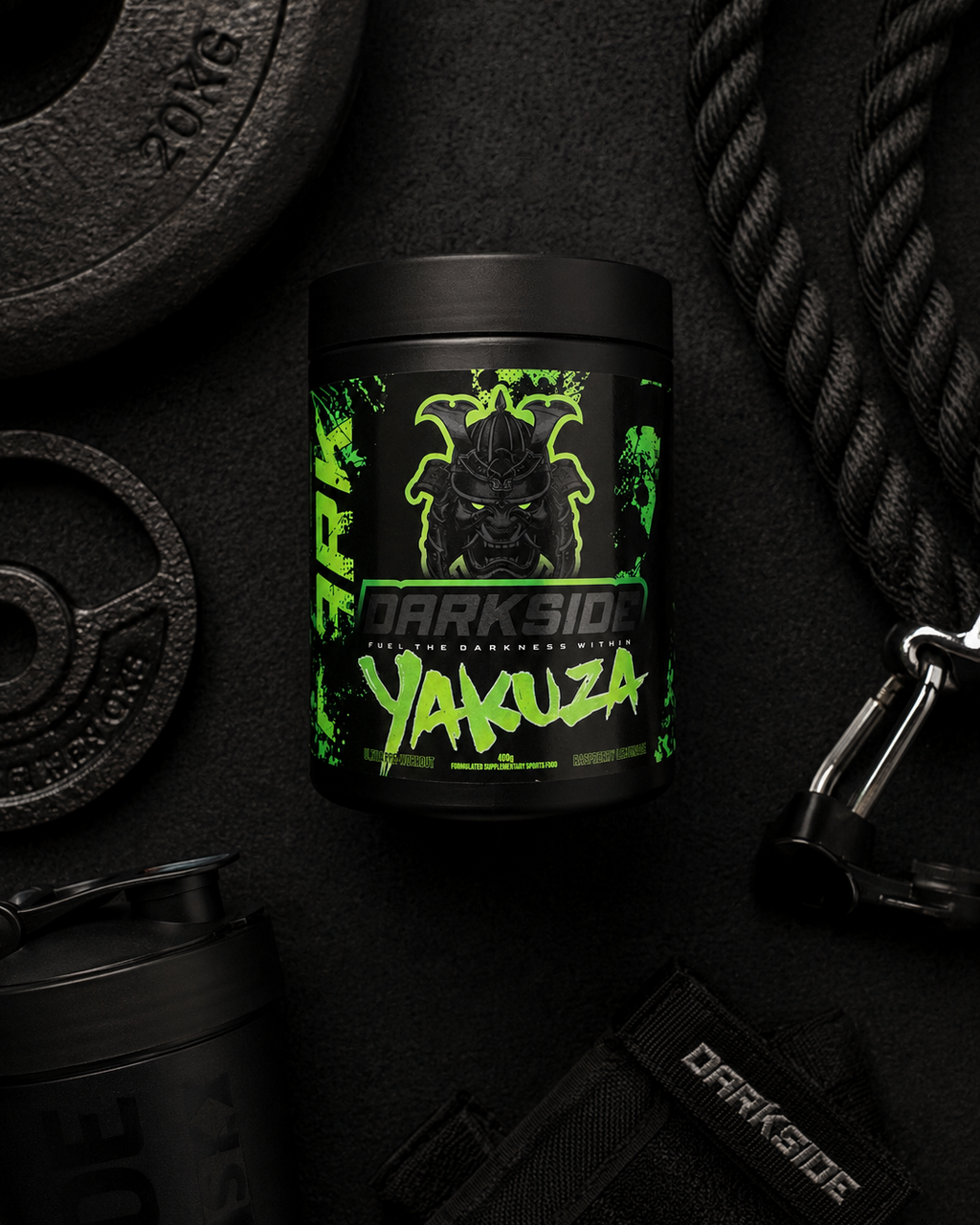 Darkside Yakuza supplement container with gym equipment on a dark background