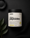 Container of switch collagen peptides on a dark background with leaves.