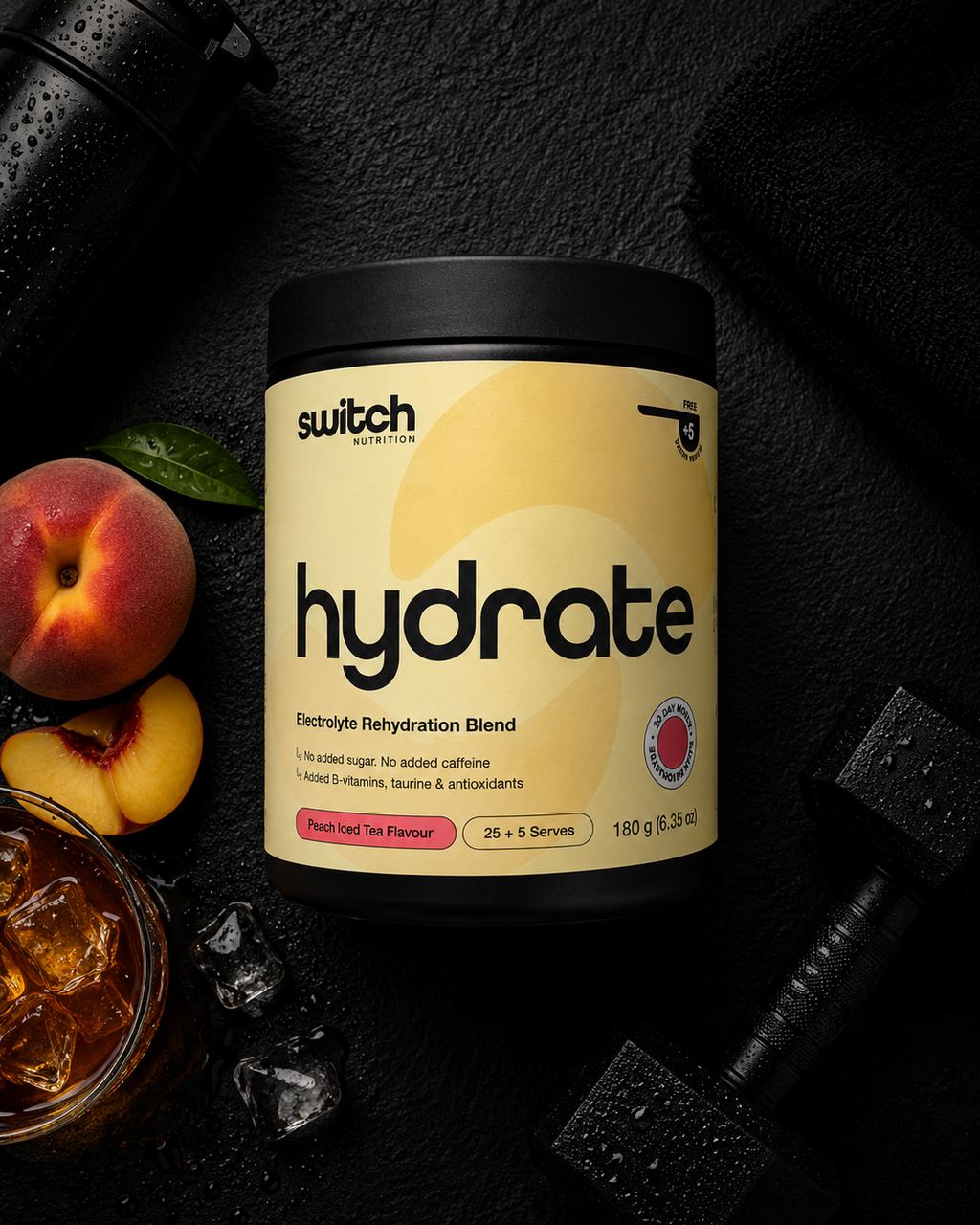 Container of 'switch nutrition' hydrate blend with peaches and iced tea on a dark background
