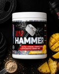 War Hammer supplement container with pineapple, mango, and measuring spoon on a dark background